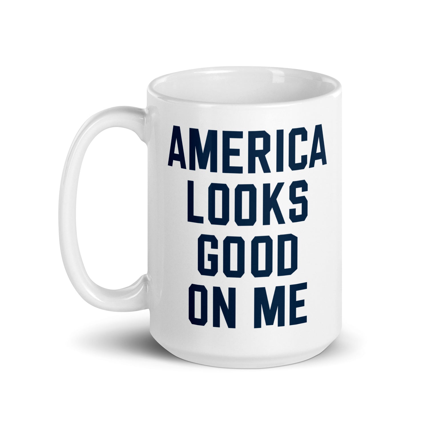 Lifestyle shot of the FOX News mug resting on a clean wooden kitchen table next to morning coffee