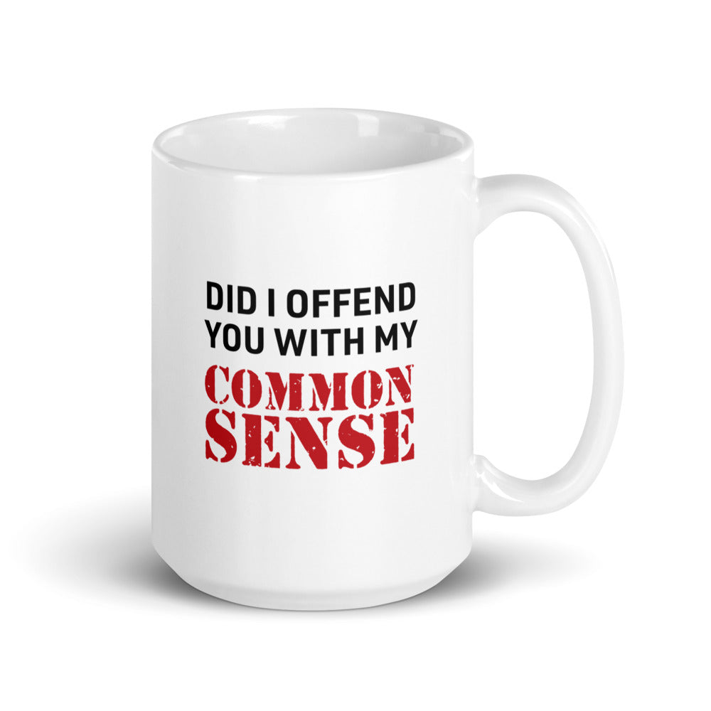 A 15oz white FOX News @ Night Common Sense mug sitting on a clean, modern American kitchen counter during a bright morning.