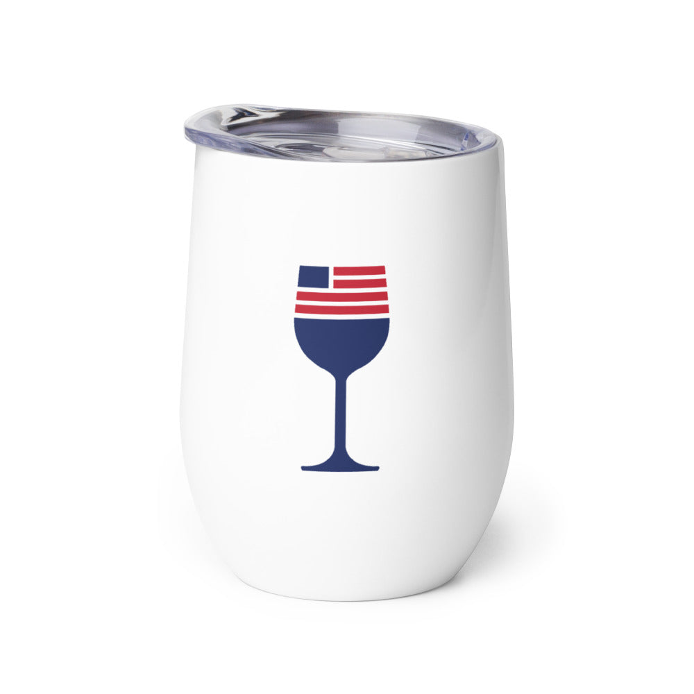 A white FOX News wine tumbler with the bold red and blue logo standing on a clean kitchen island in an American home.