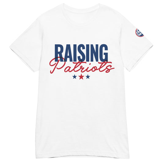 Close-up of the crisp Raising Patriots logo on the front of a white women's crewneck t-shirt.