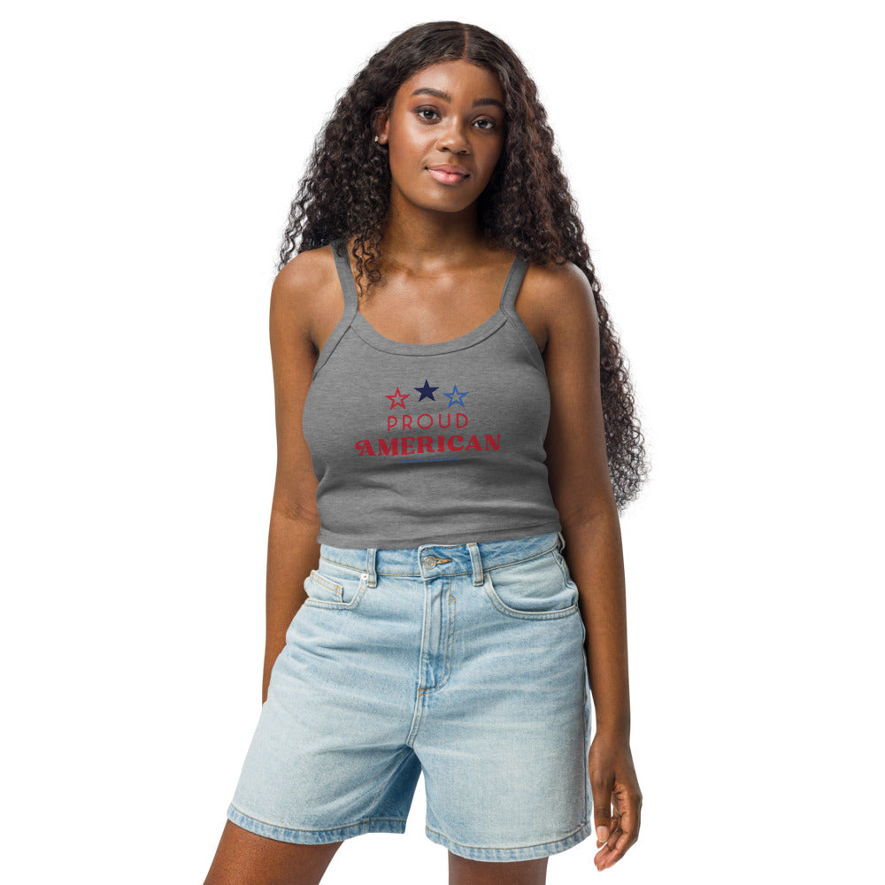 A woman wearing the FOX News micro-rib tank top in Athletic Heather in a suburban backyard.