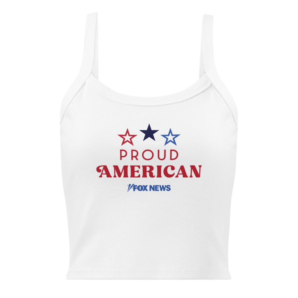 A woman wearing the FOX News tank top while relaxing in a modern living room.