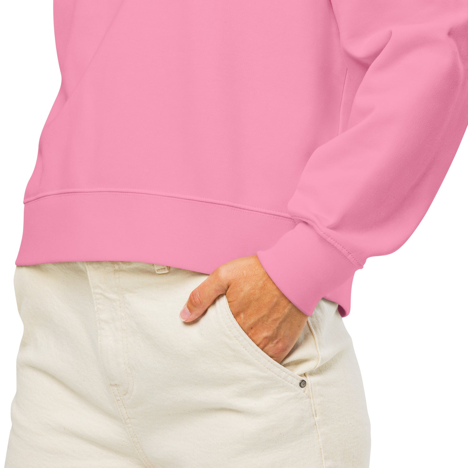 Lifestyle image showing a smiling woman wearing the Bubble Pink FOX News Proud American Mom sweatshirt in a comfortable home interior.
