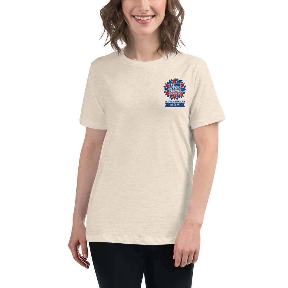 A folded display of the FOX News Proud American Mom t-shirt on a clean wooden surface, highlighting the vibrant embroidery.