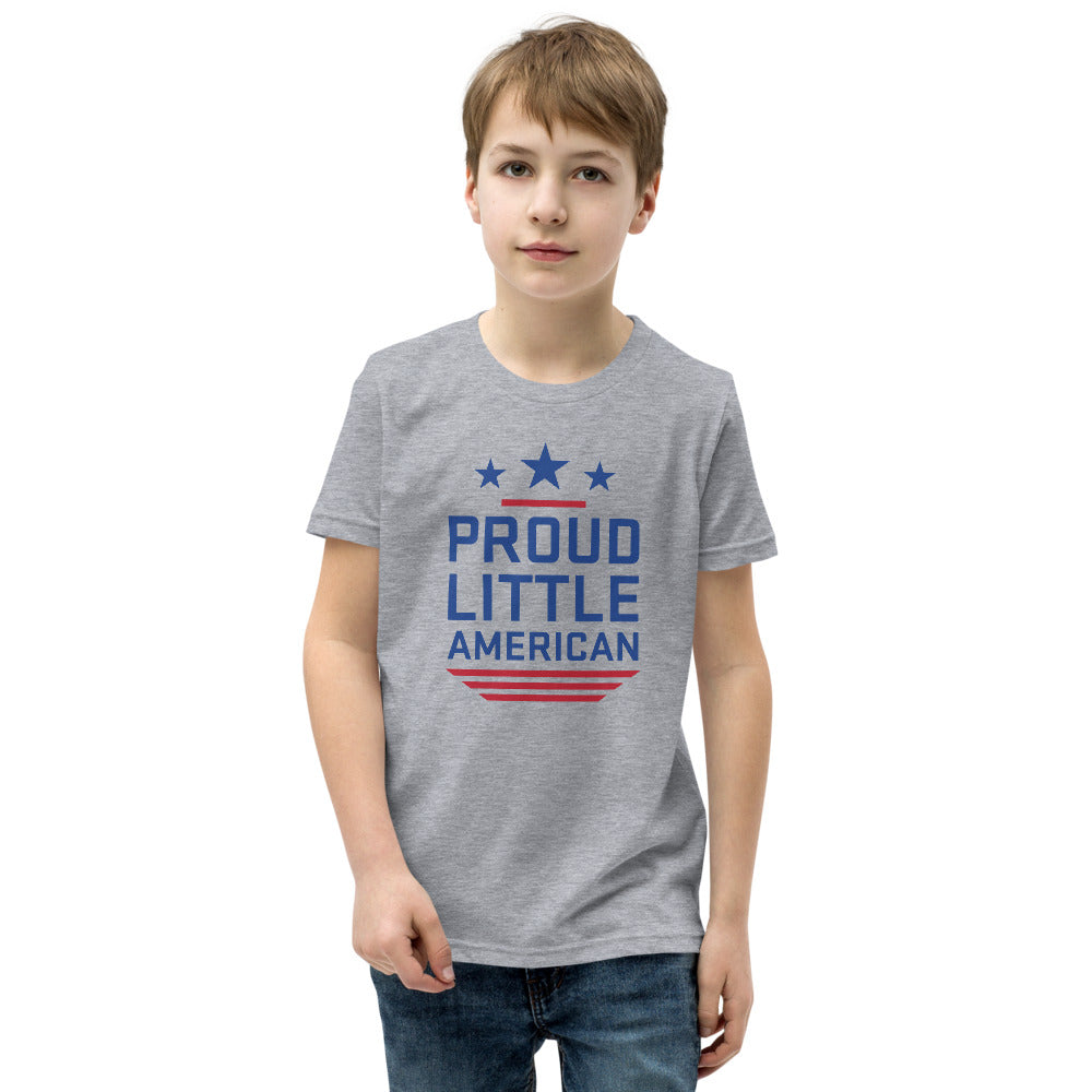 An American family setting with a child wearing the FOX News patriotic youth shirt during a morning breakfast.