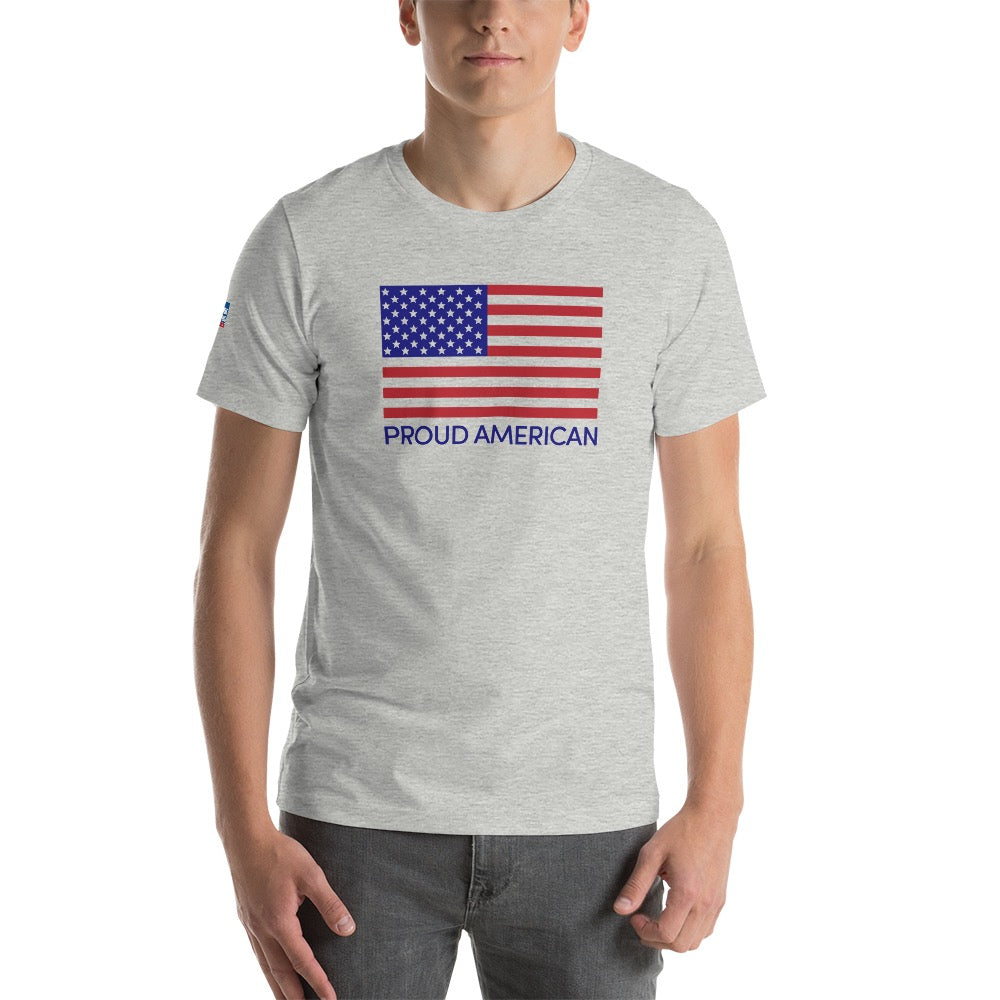A male viewer wearing the Proud American T-Shirt in a suburban backyard morning setting.