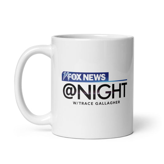 A clean kitchen counter setting featuring the crisp white ceramic FOX News @ Night Common Sense Mug with a clear view of the bold text design.