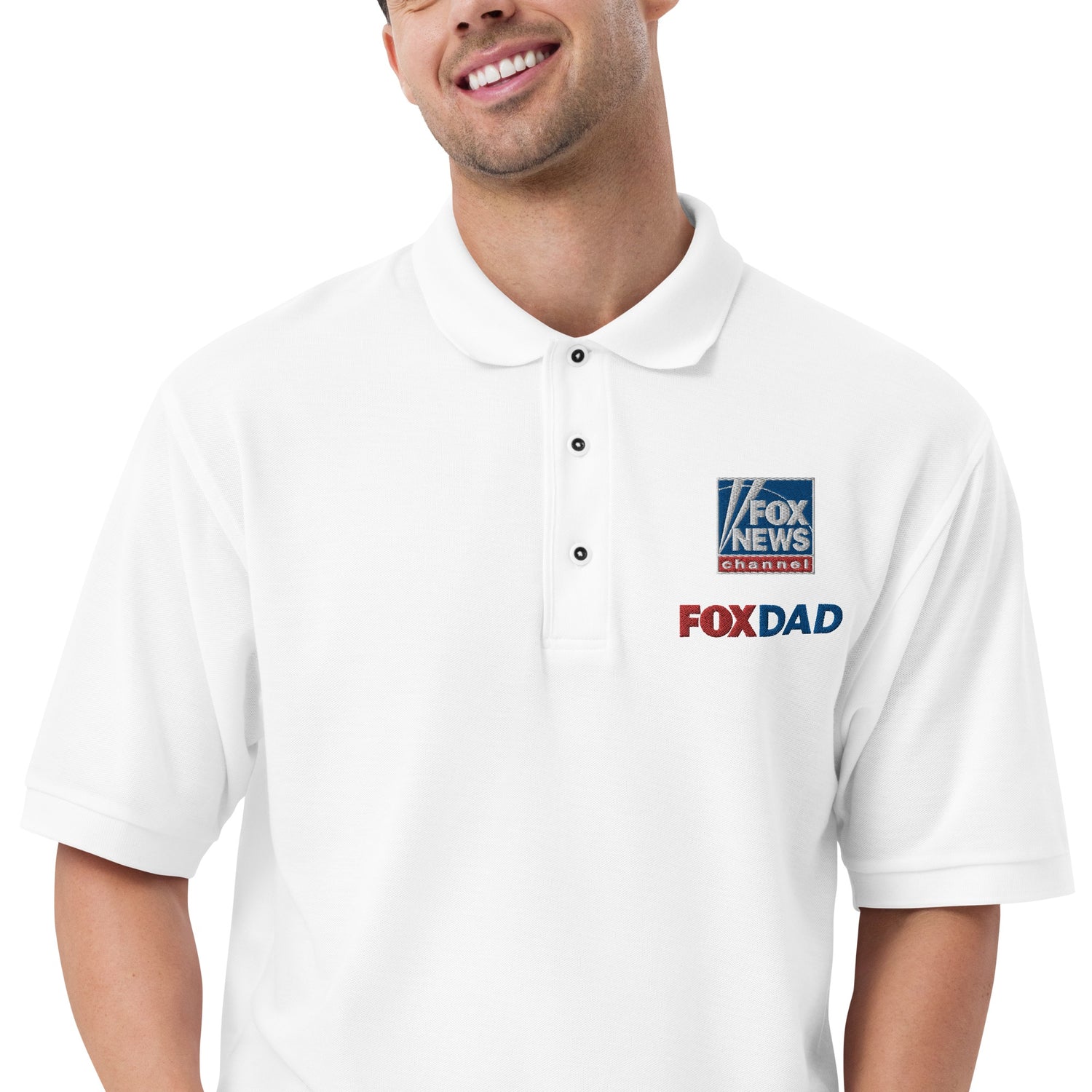 An overhead lifestyle flat lay featuring the FOX News Dad Embroidered Polo Shirt alongside a morning coffee mug in a classic American kitchen setting.