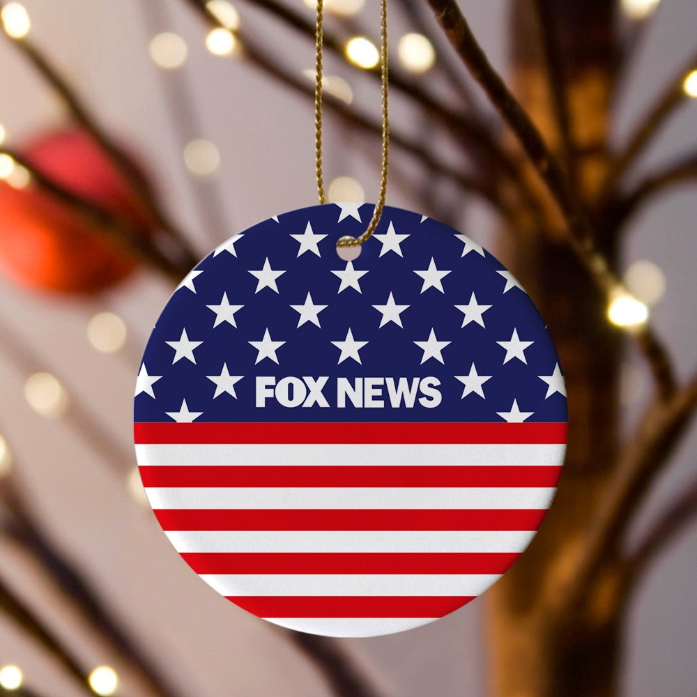 A customized holiday ornament featuring the iconic American flag design and bold FOX News branding.