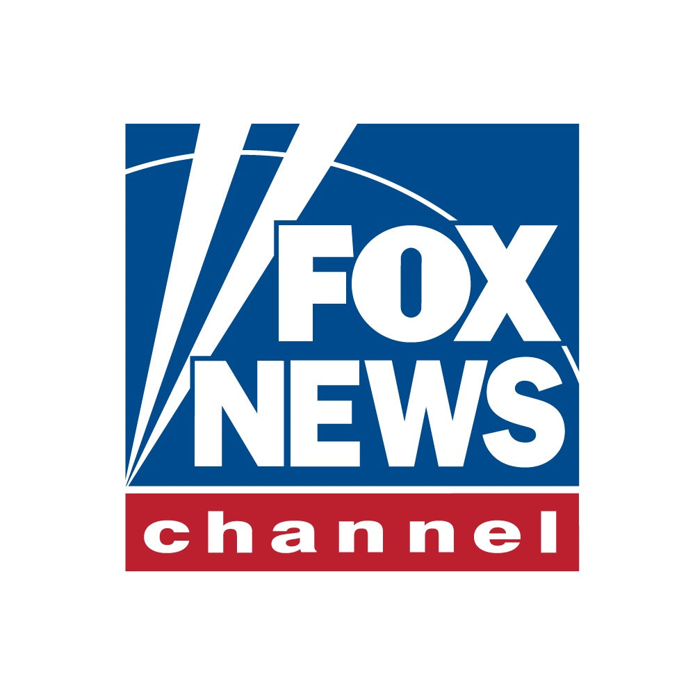 Close-up shot of the FOX News logo perfectly centered on a clean white 11oz ceramic coffee mug set against a warm, neutral background.