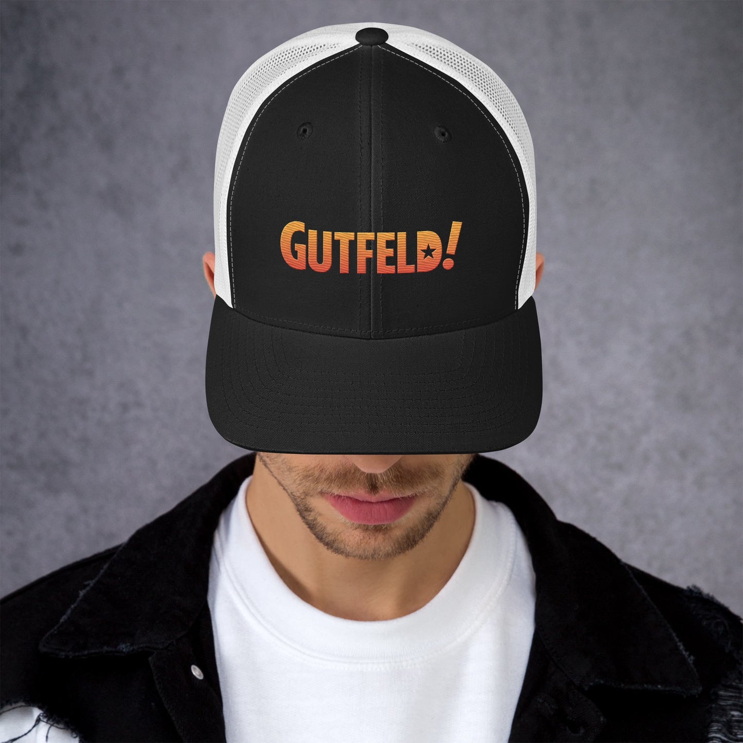 Close-up of the Gutfeld! logo embroidery on the front of the adjustable hat.