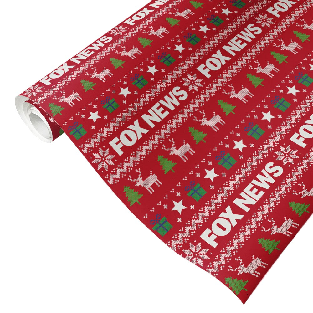 A roll of official *FOX News* Holiday Gift Wrap featuring a repeating network logo pattern in a festive design.