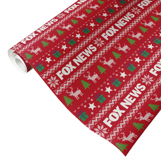A roll of official *FOX News* Holiday Gift Wrap featuring a repeating network logo pattern in a festive design.