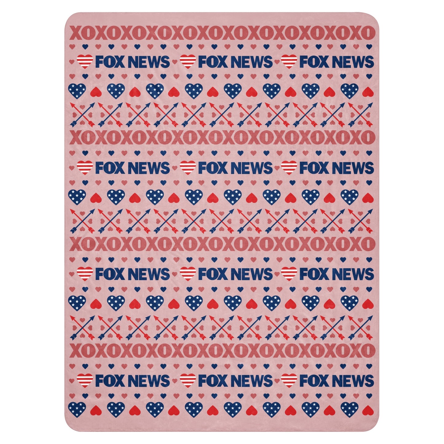 A cozy American living room setting featuring the FOX News Heart Sherpa Blanket draped neatly over a comfortable sofa.