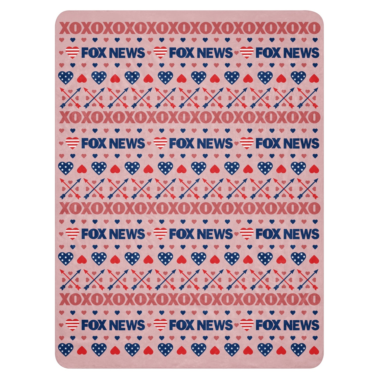 A cozy American living room setting featuring the FOX News Heart Sherpa Blanket draped neatly over a comfortable sofa.