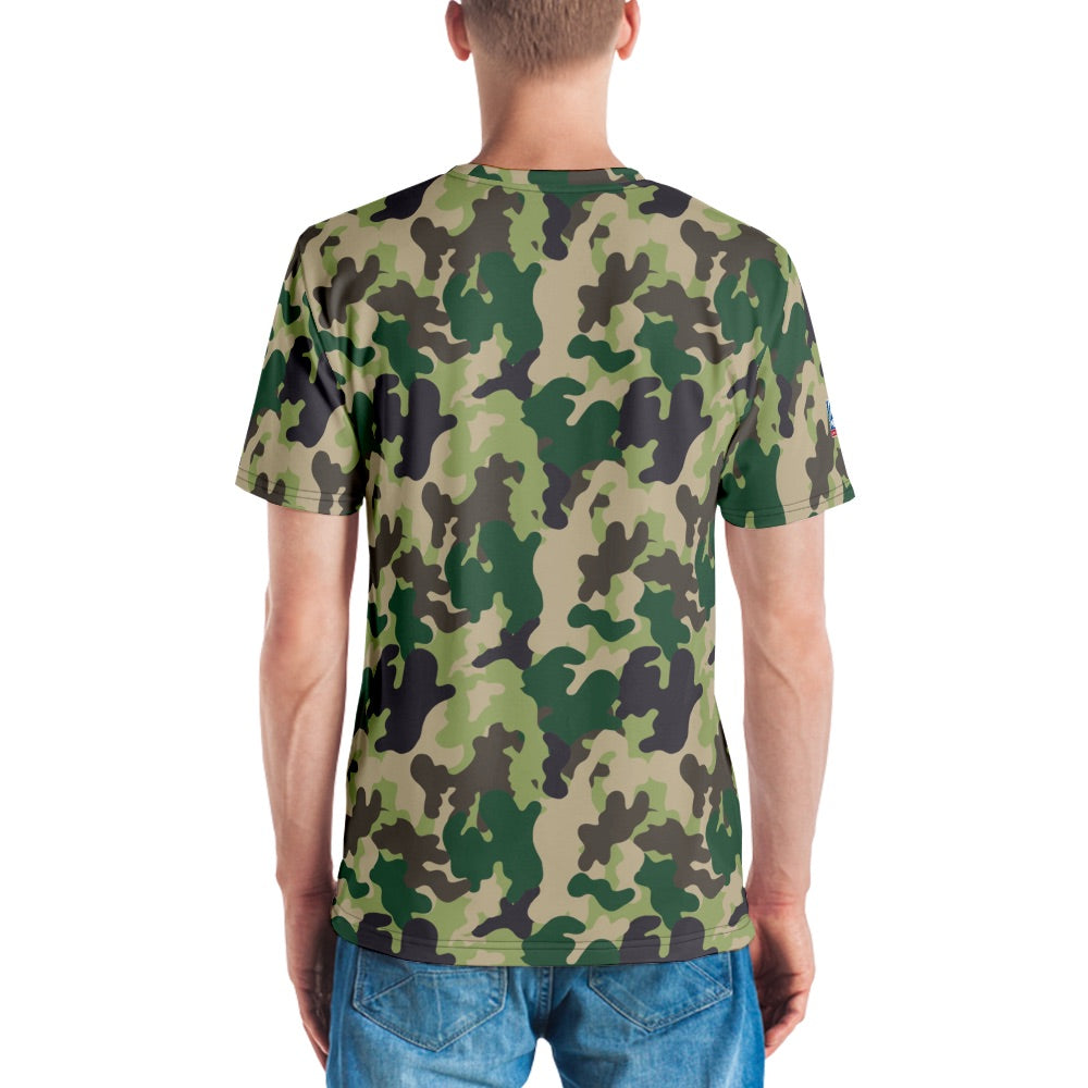 Folded FOX News Camo Short Sleeve T-Shirt resting on a rustic wooden table indoors.