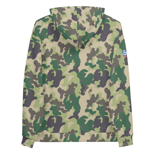 A person wearing the FOX News camo hoodie in a comfortable, suburban backyard setting during a crisp morning.