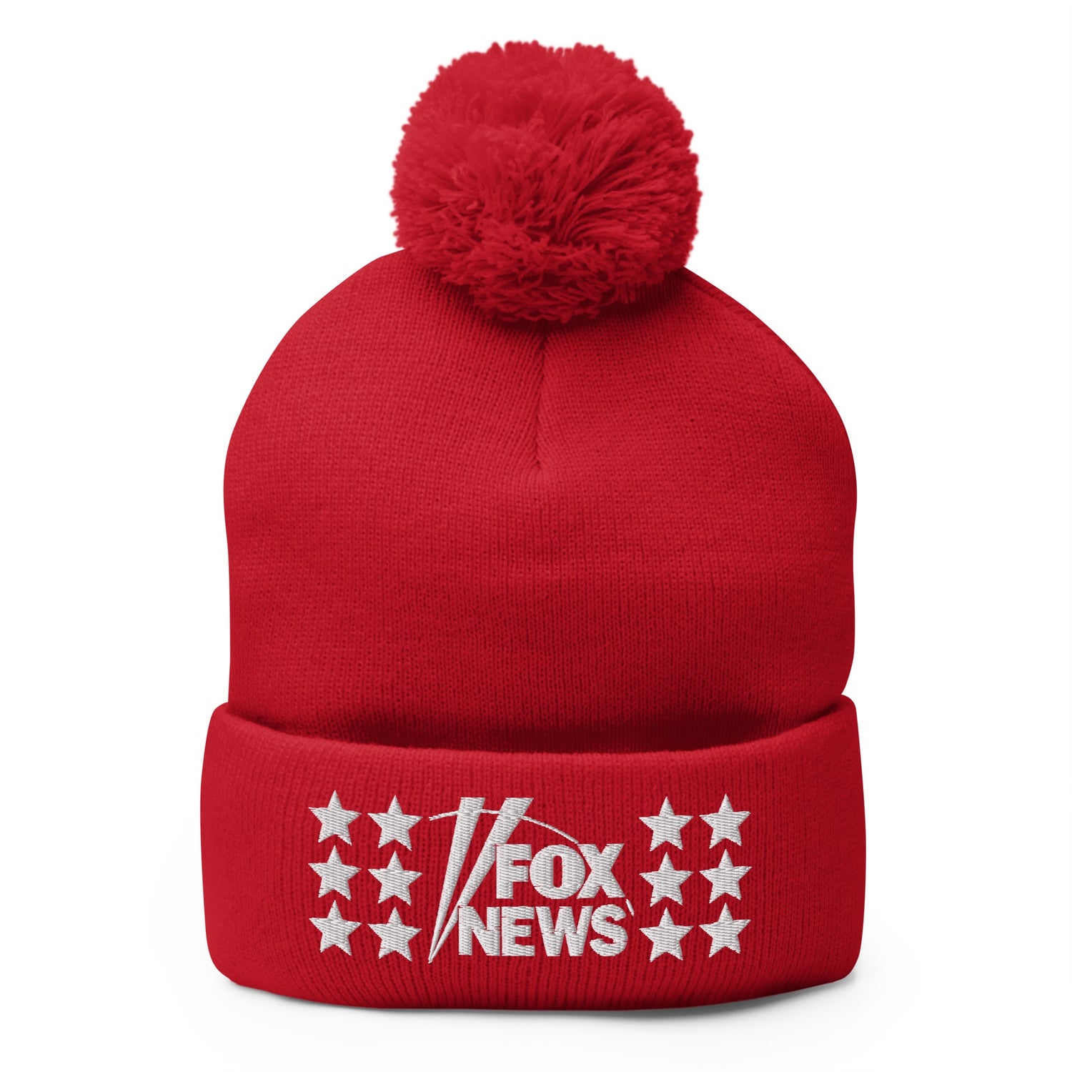A navy blue and a red FOX News beanie displayed together in a cozy outdoor backyard morning setting.