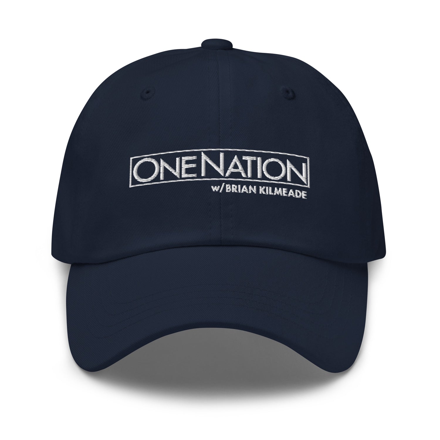 A backyard morning coffee setting featuring the FOX News One Nation hat placed neatly on an outdoor wooden table.
